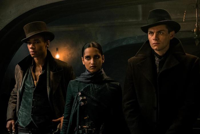 The Crows — Jesper Fahey (Kit Young), Inej Ghafa (Amita Suman), and Kaz Brekker (Freddy Carter) — in <i>Shadow and Bone</i>